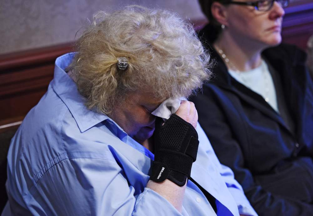 Daniel French&#39;s sister, LeeAnn Ifcic cries  during the sentencing hearing